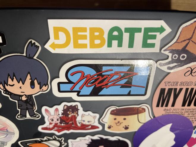 Debate sticker in the style of subway on a friend&rsquo;s laptop