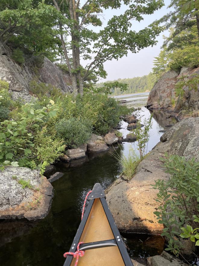 Portaging through Tiny Waterfall to reach Terry Lake